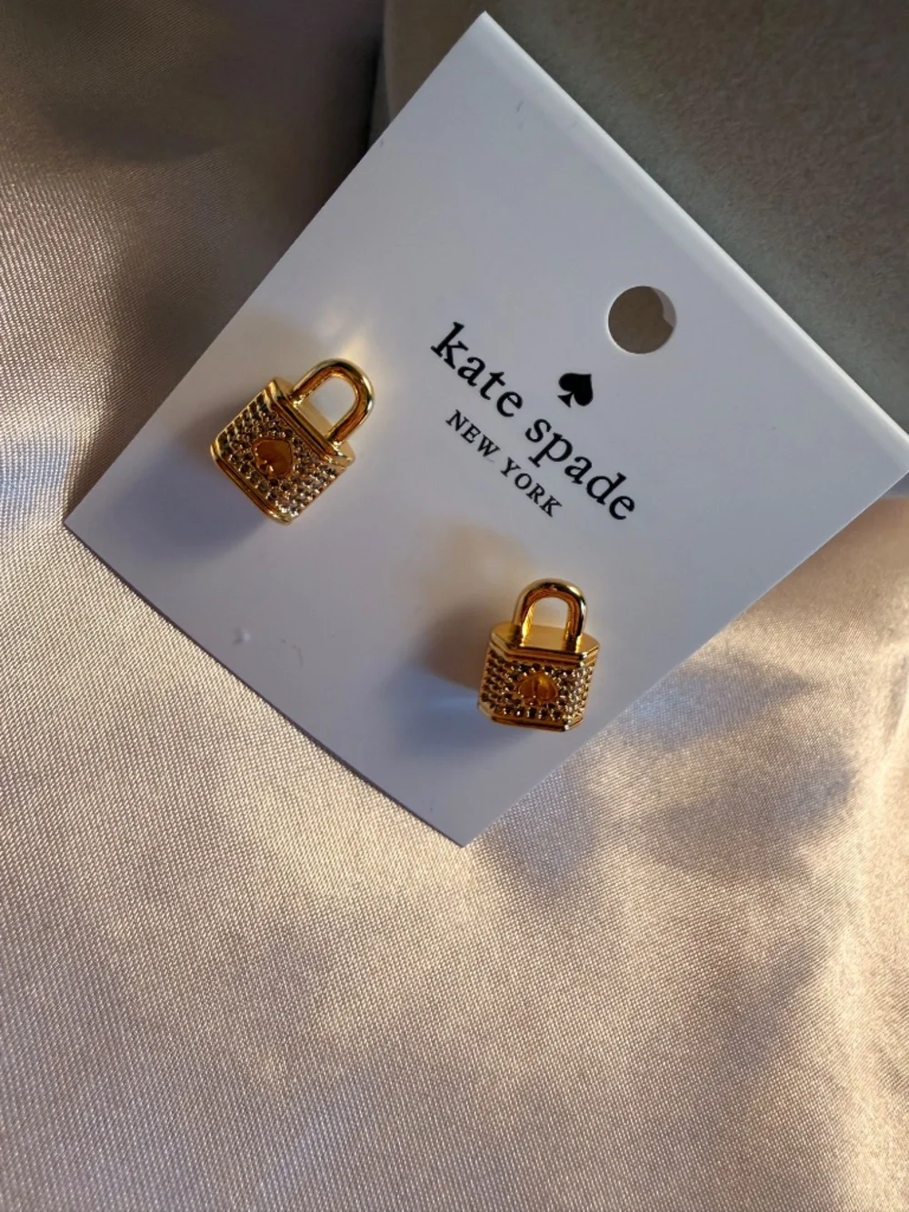 Kate Spade gold lock earrings